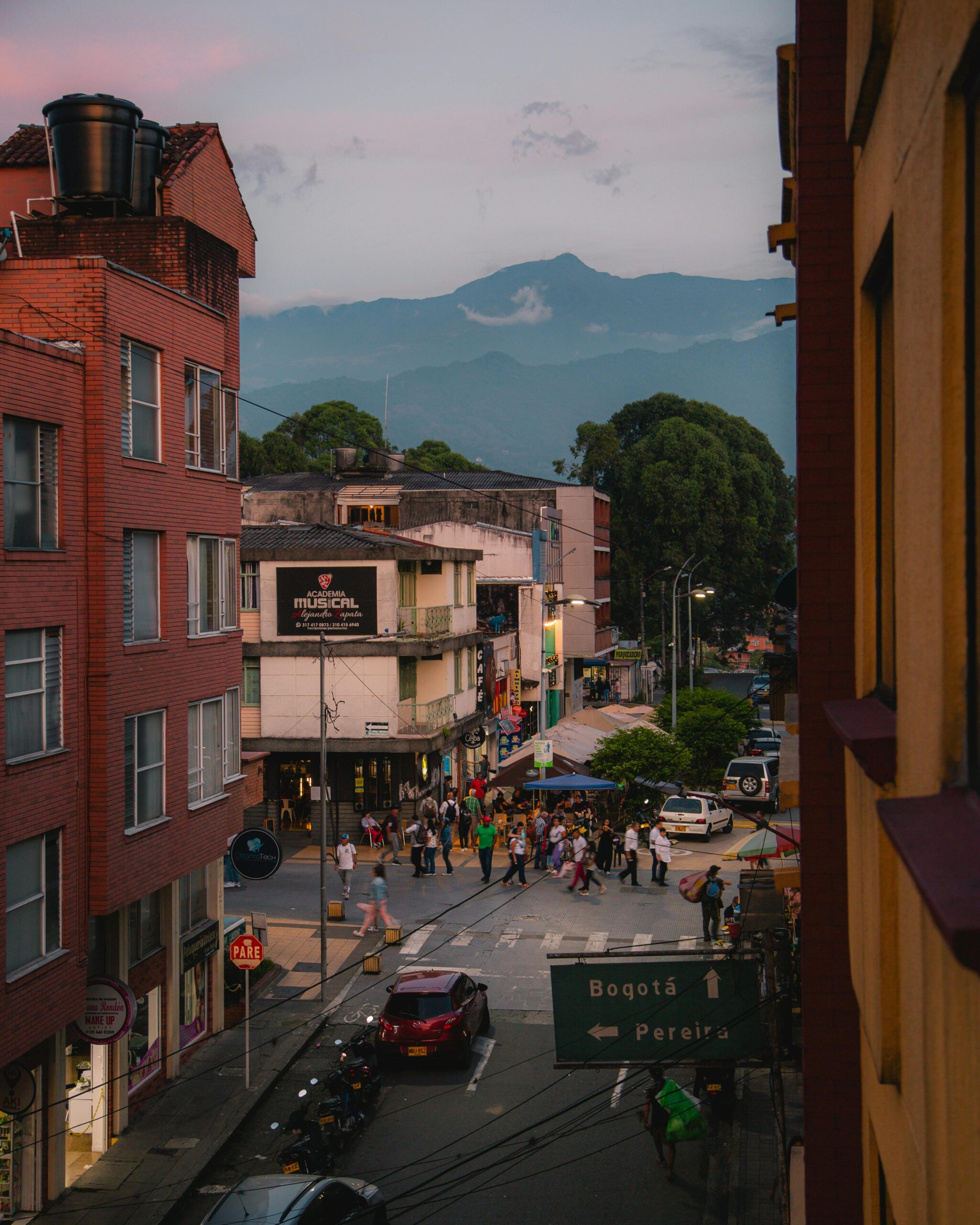 High-Angle Shot of People Walking on the Street near Buildings